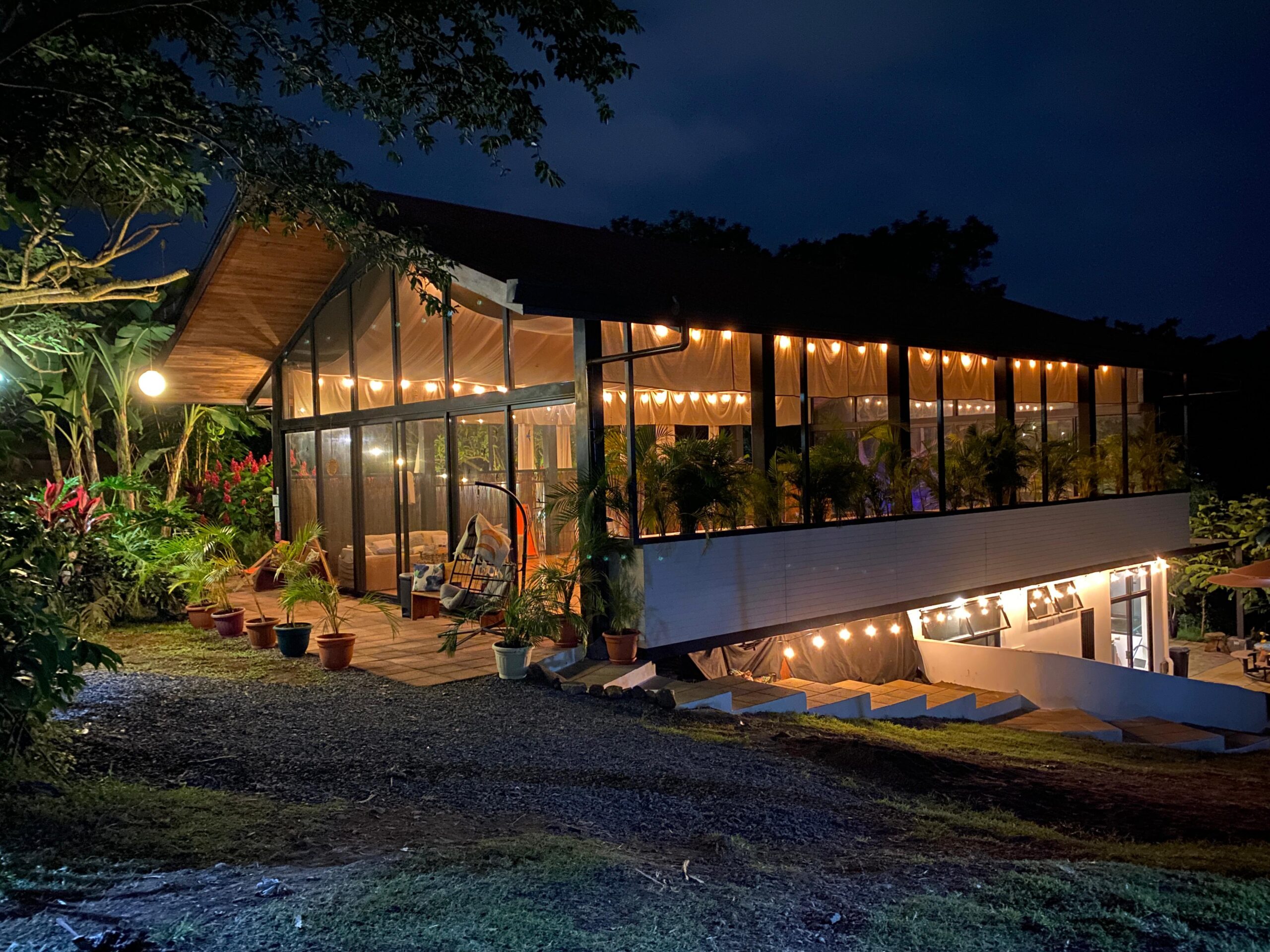 The retreat property glowing at dusk