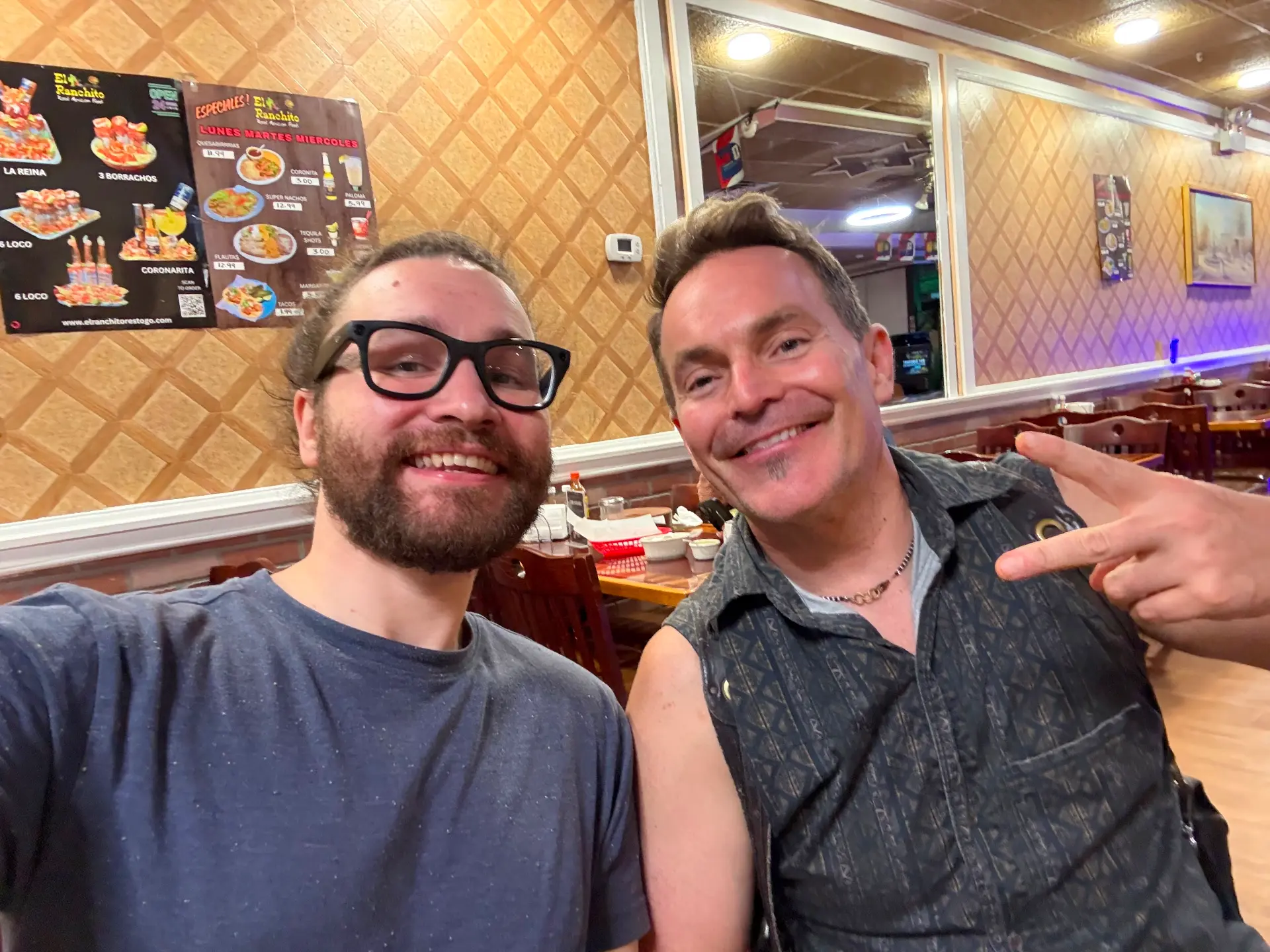 David Prorok and DTO smiling together, DTO making a peace sign