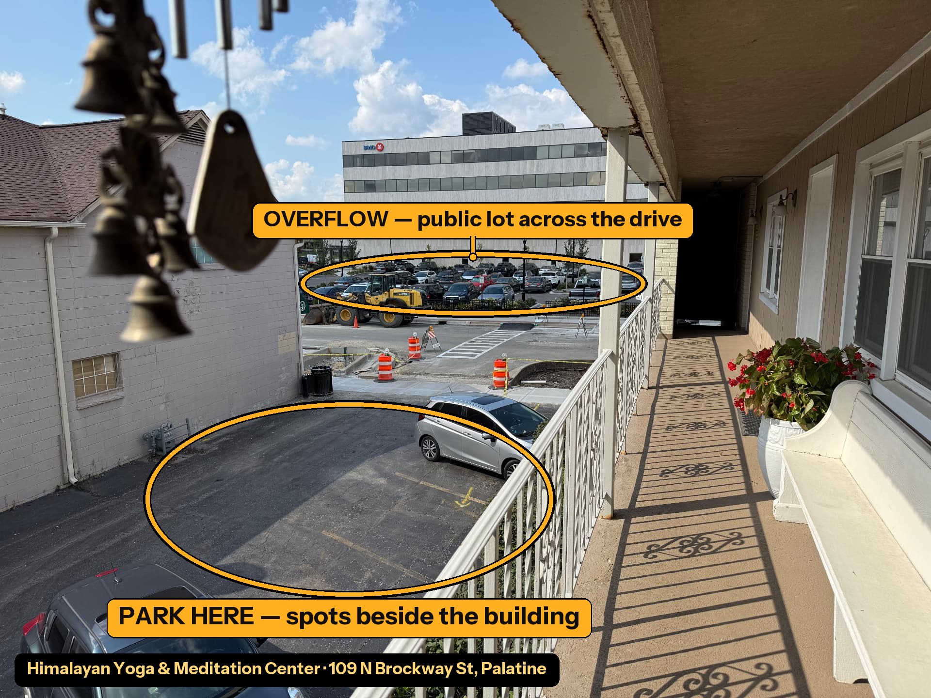 Annotated aerial photo from the HYMC balcony showing the parking spots next to the building and the additional lot further out.